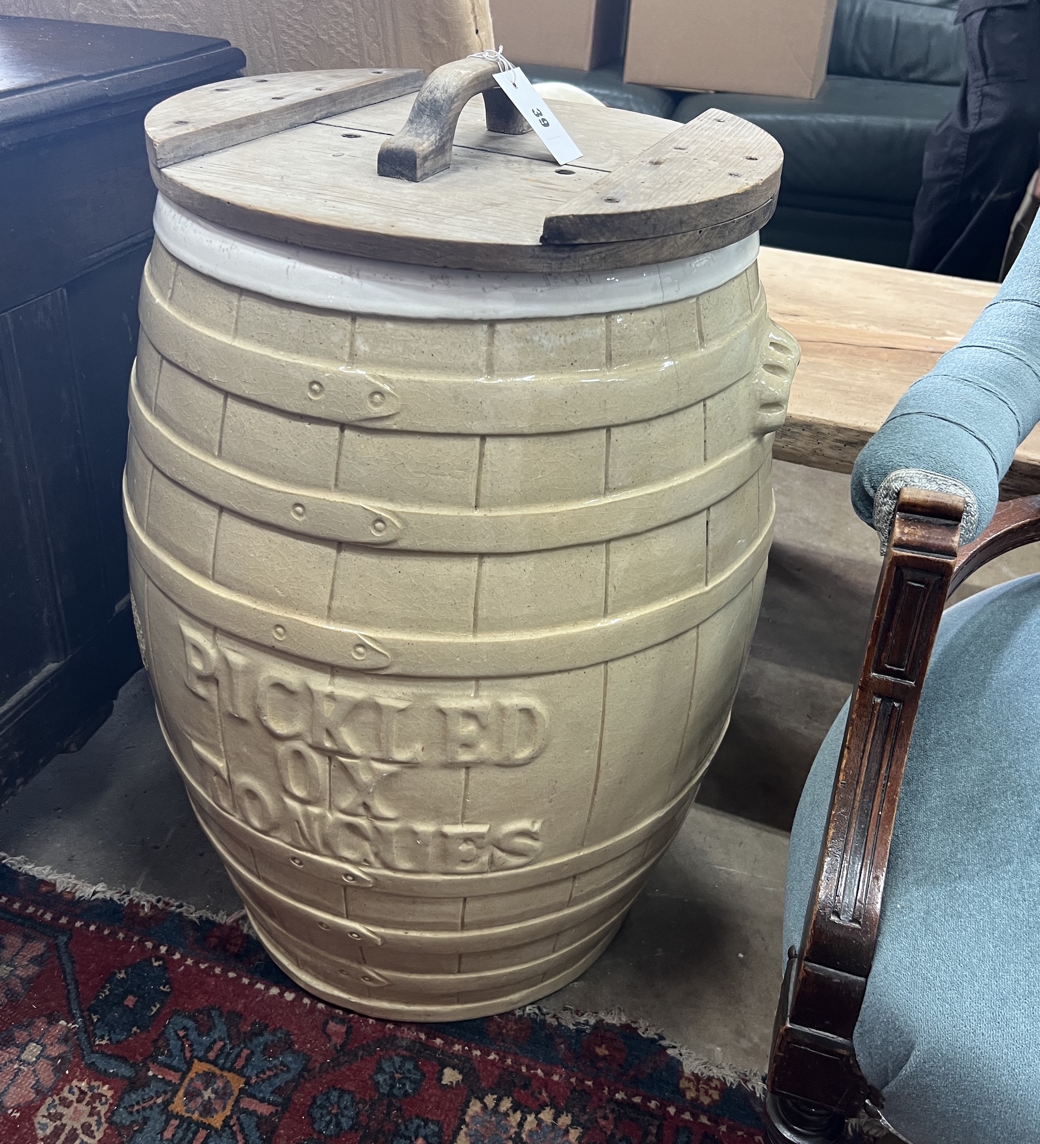 A Victorian glazed earthenware pickled ox tongue barrel with wood cover, width 46cm, height 74cm